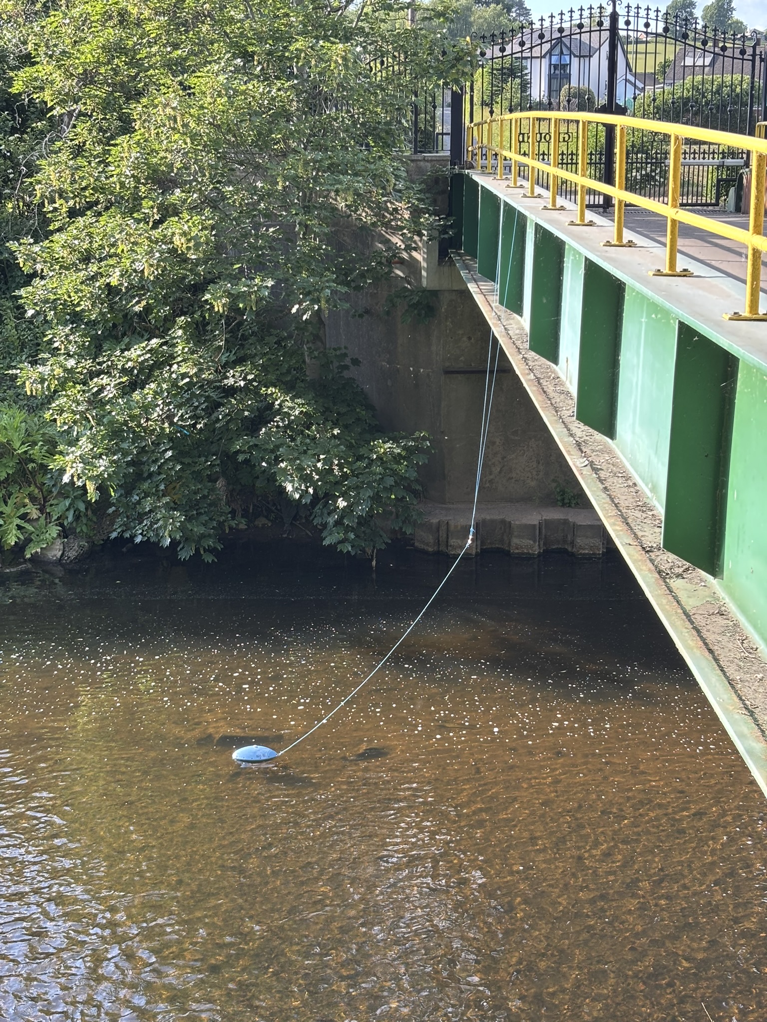 A water quality sensor floating in the River Darwen