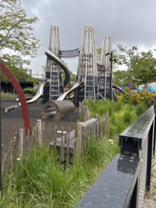 The playground in the park centres around the river